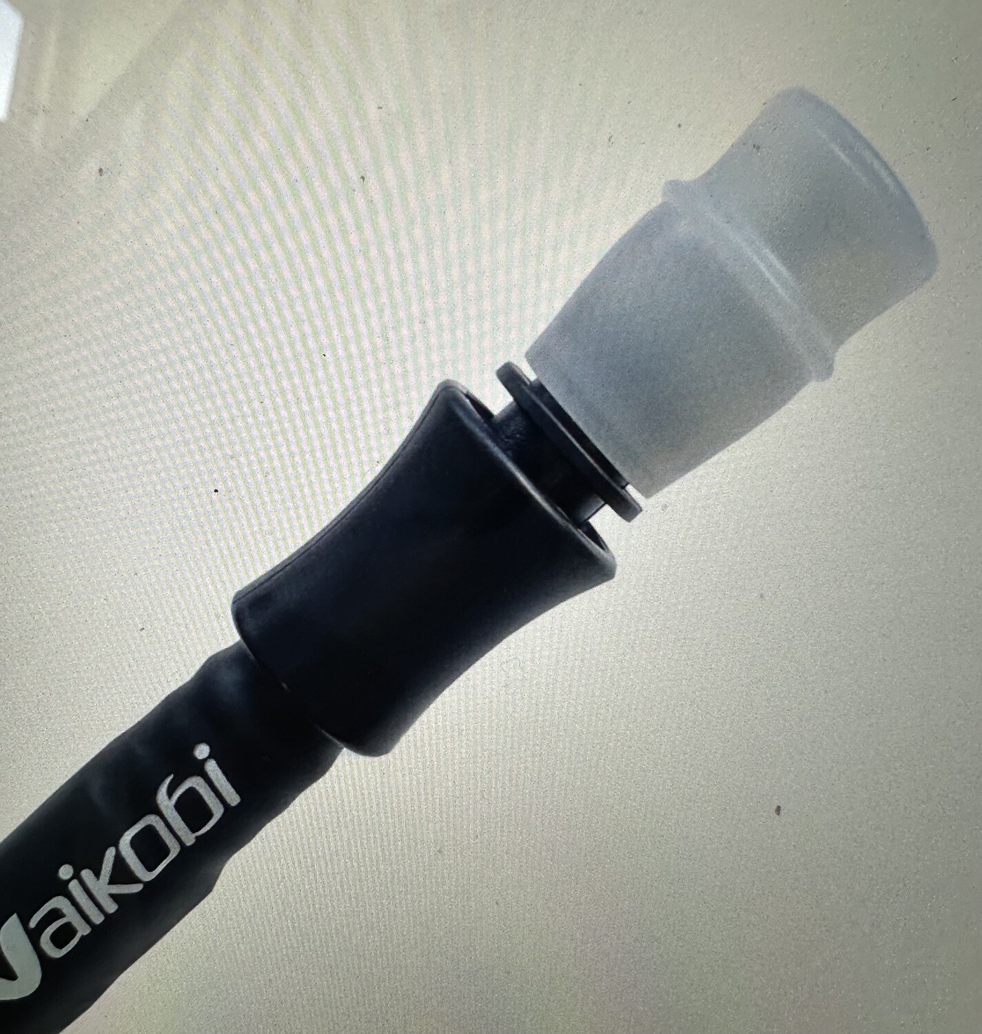 Hydration bladder mouthpiece with connector