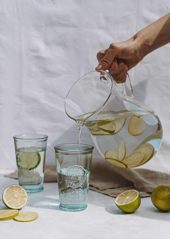 Lemonade with lavender syrup served in glass pitcher