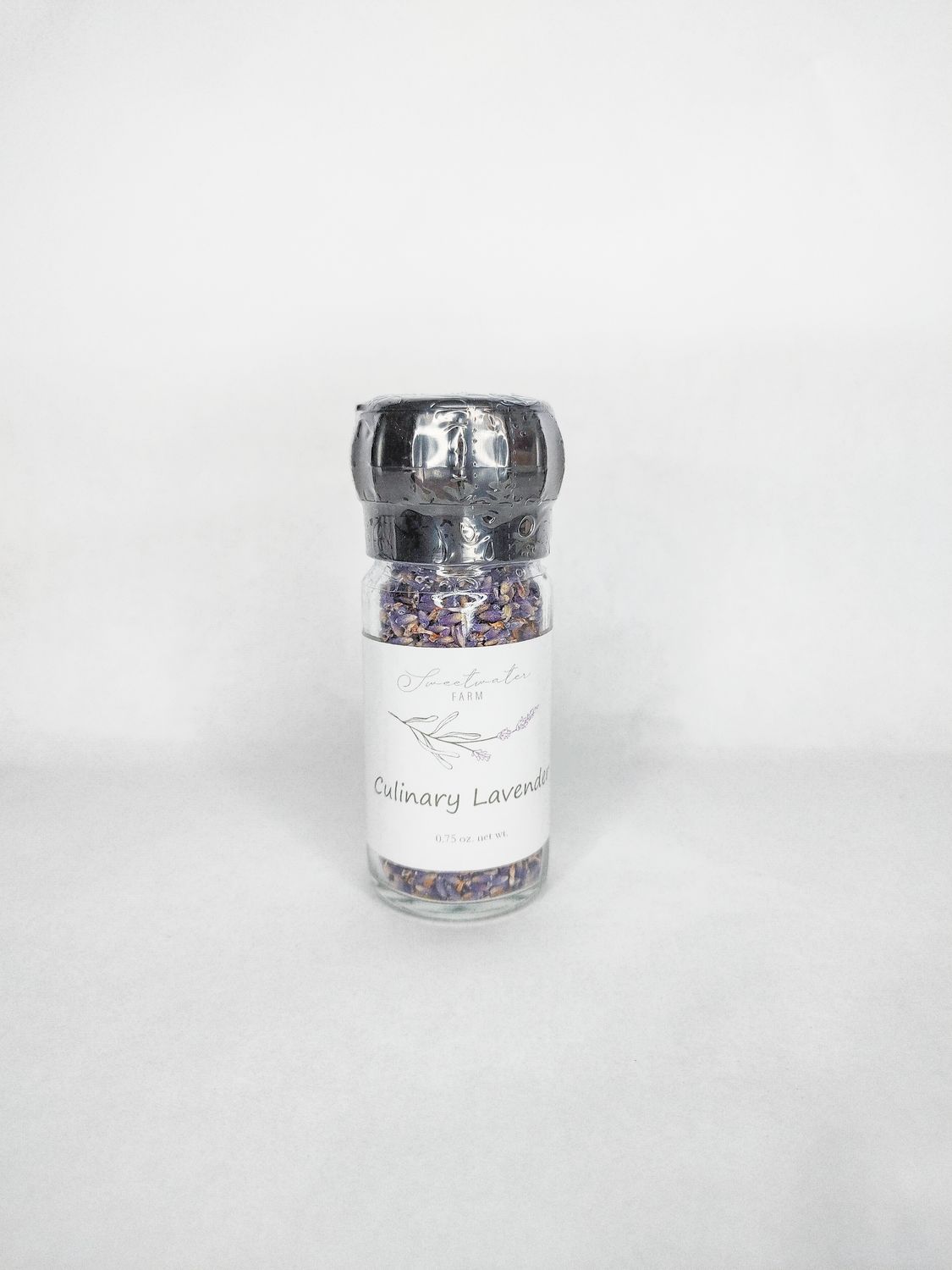 Gourmet culinary lavender spice in glass grinder