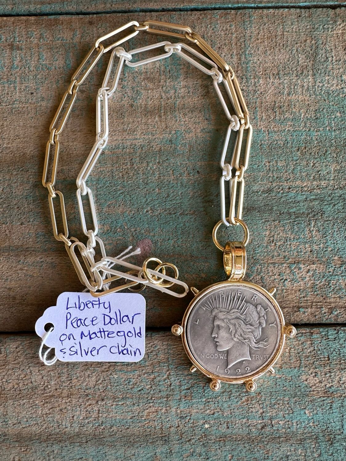 Liberty Peace Dollar On Gold and Silver