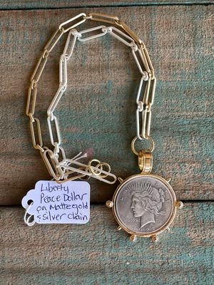 Liberty Peace Dollar On Gold and Silver