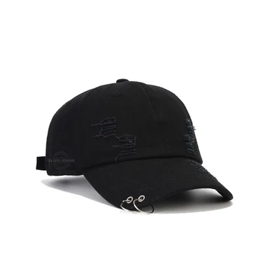 Deep black distressed denim cap with metal double ring detail, streetwear style