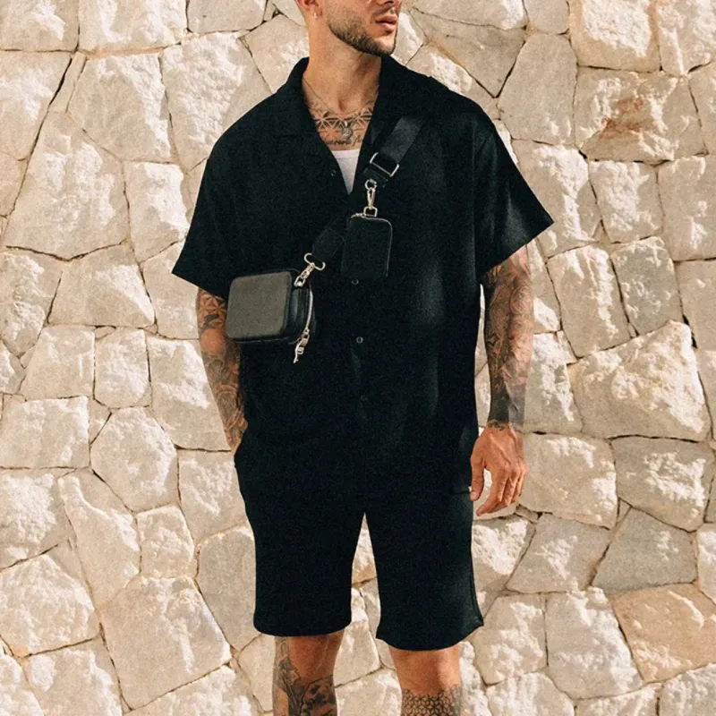 Men&#39;s black matching shirt and shorts set for poolside wear