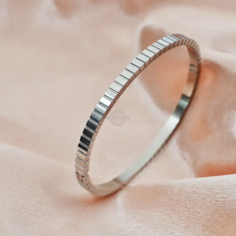 Silver stainless steel bangle with stacked cube design