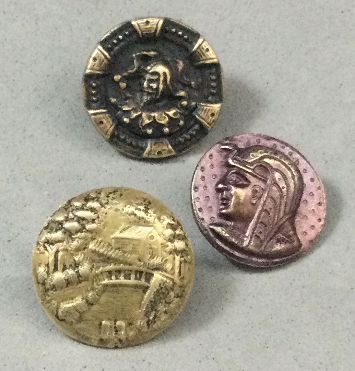 Three Small Brass Picture Buttons including Jester