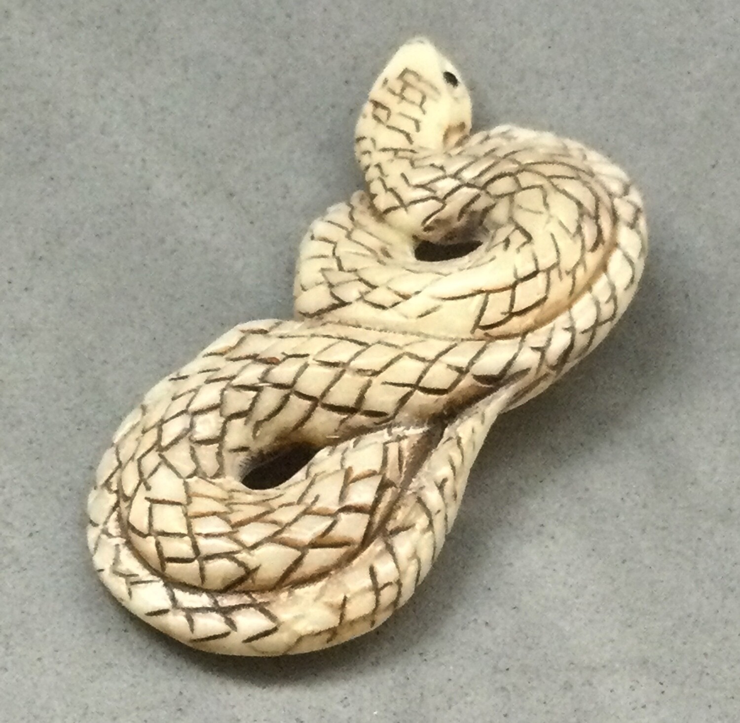 Large Carved and Inked Bone Snake