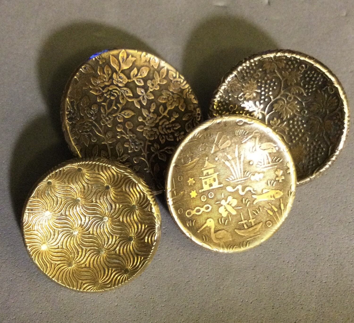 Four Medium size Brass Wallpaper Buttons