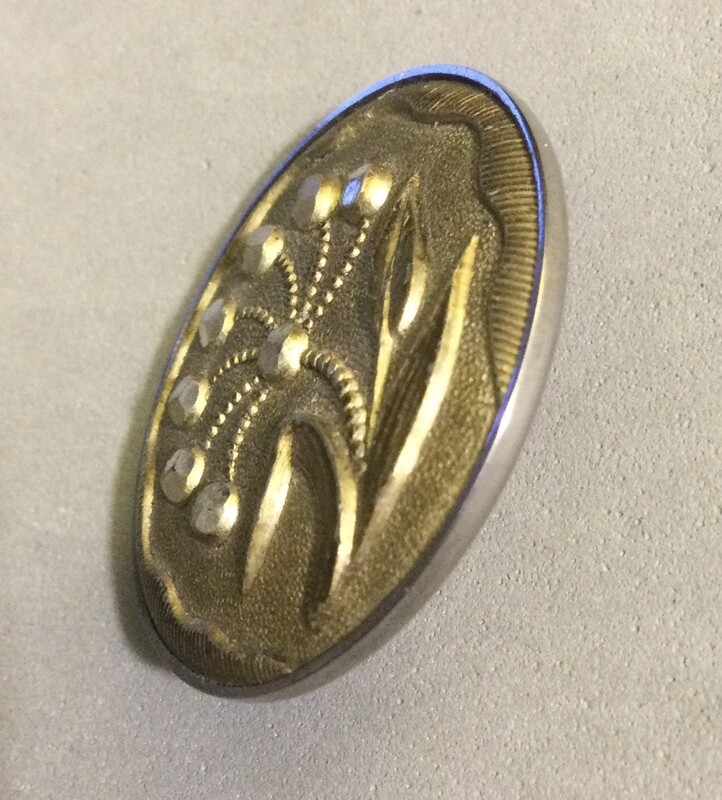 Floral tinted pewter in a steel cup, Medium
