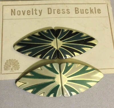 Two Celluloid “glow” Two-part Buckles