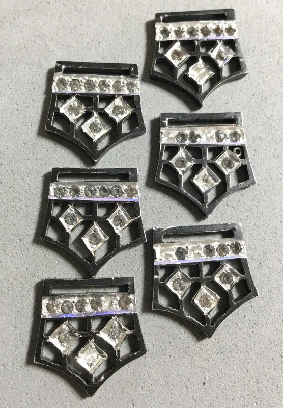 Six Antique Aluminum Trim Pieces