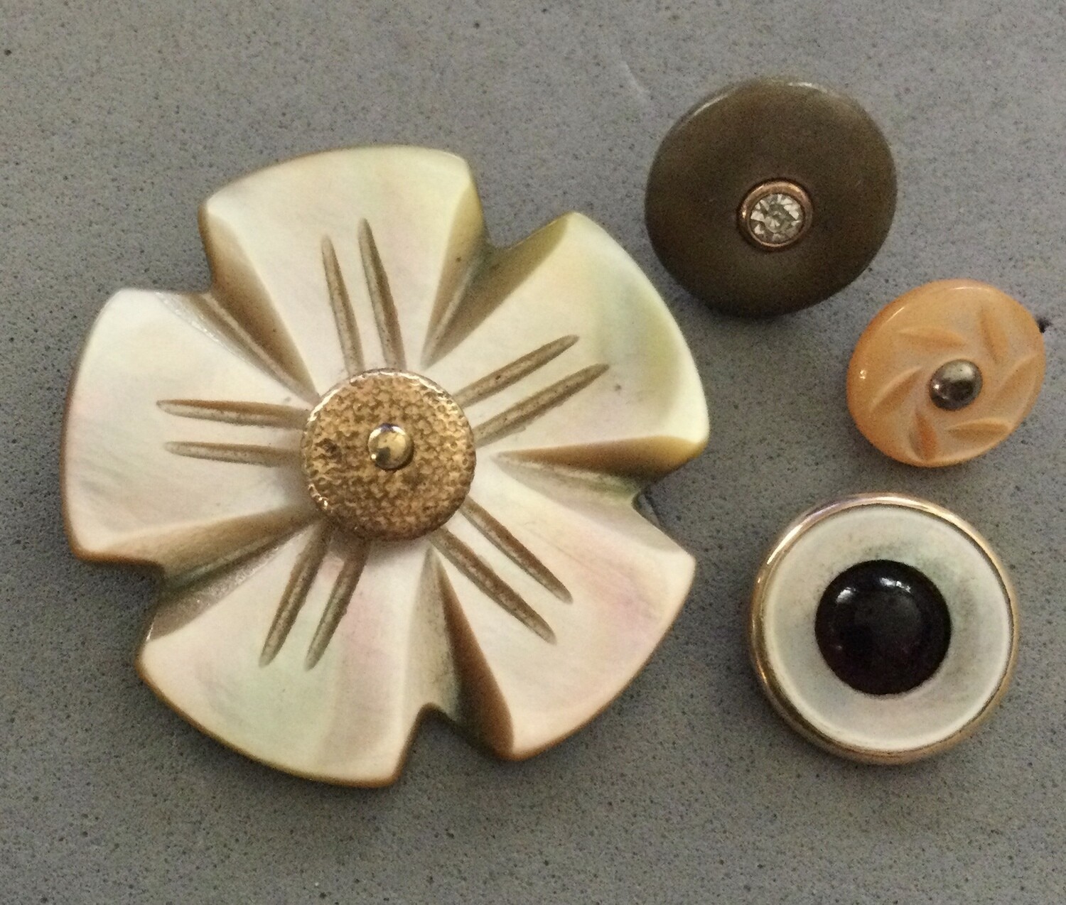 Four Shell Buttons with Centers