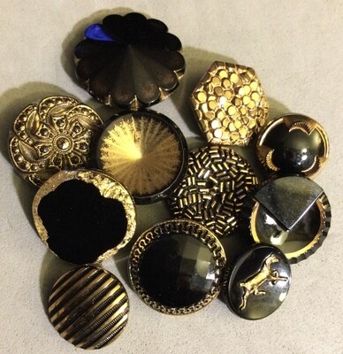 Group of Eleven Black Glass with Gold Luster