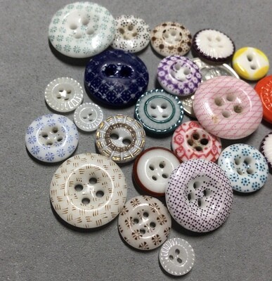 22 ASSORTED CHINA BUTTONS, 4 DIMI