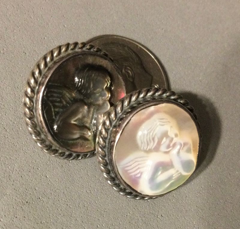 PAIR of LASER CARVED SHELL CHERUB SET IN STERLING, Small