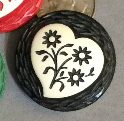 Three Buff Celluloid Hearts and Flowers