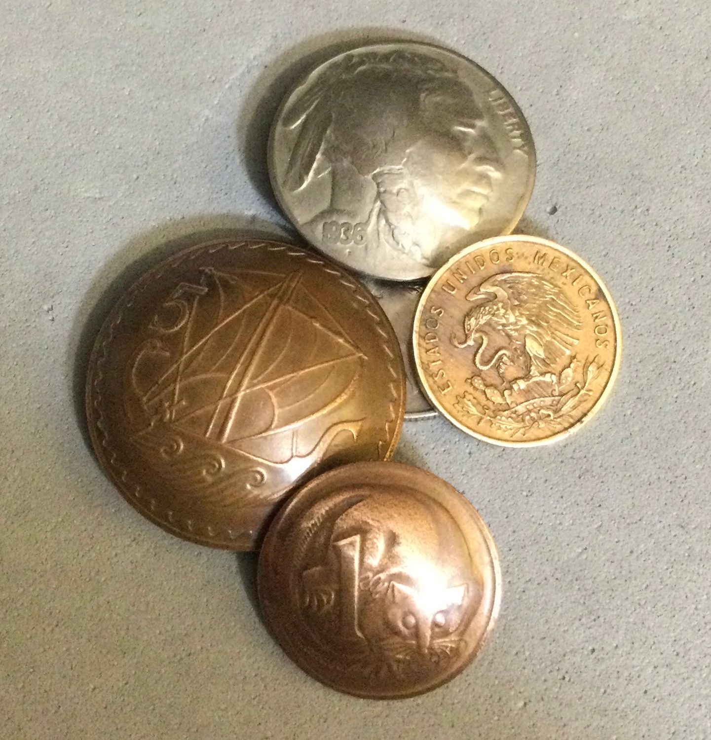 Four buttons from coins