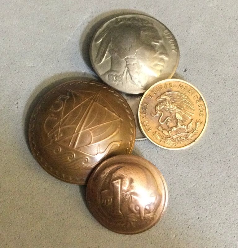 Four buttons from coins