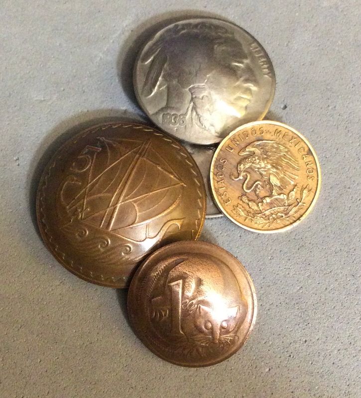 Four buttons from coins