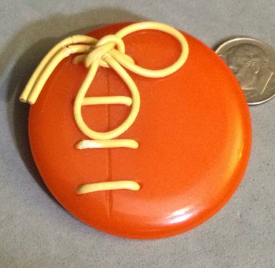 “Laced” Orange Bakelite. TWO INCHES