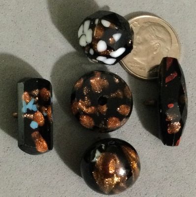 Group of Five Black Glass with Goldstone and Color