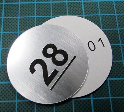 1.5mm 62.5mm round engraved laminate discs (€2.19 each)