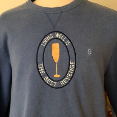 Living Well Is The Best Revenge, with a flute of bubbly, embroidery on long sleeved sweat shirt