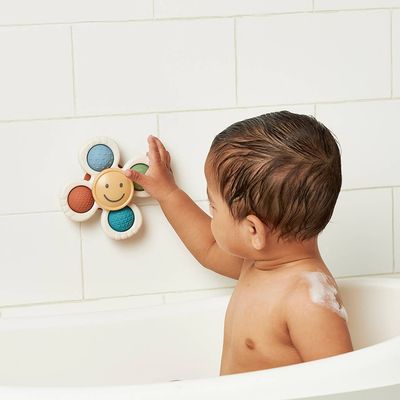 567 Itzy Ritzy Itzy Pop &amp; Whirl Bath &amp; Travel Toy - Smile