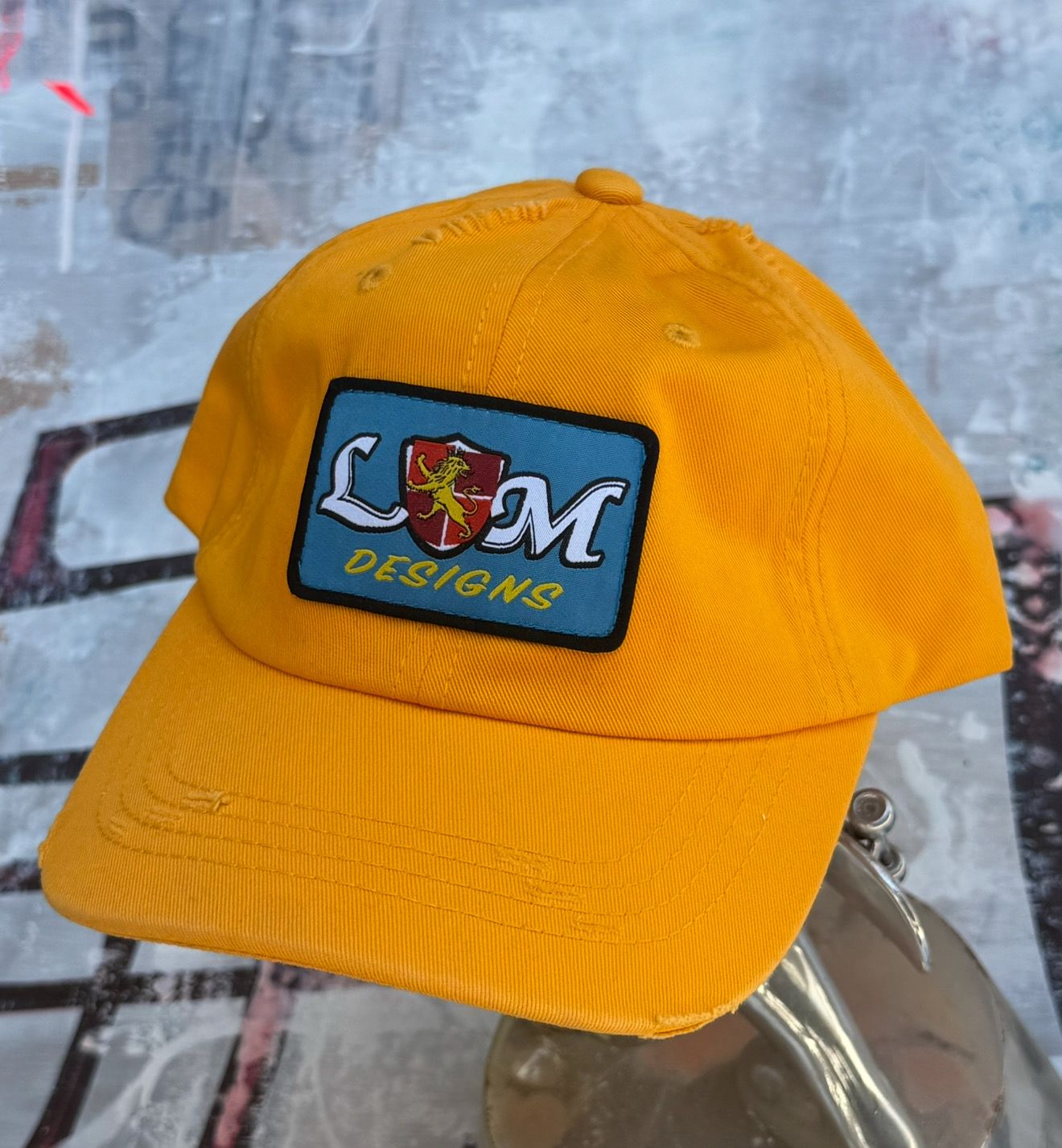 LM_Shield_Hat_yellow_distressed