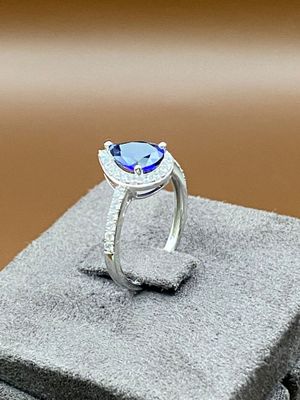 Goldring Weissgold mit blauem Stein Tropfen seitliche Steinbesatz in Zirkonia Damenring Ring 585 / 14 Karat TON560230A765W Goldring Weissgold mit blauem Stein Tropfen seitliche Steinbesatz in Zirkonia Damenring Ring 585 / 14 Karat TON560230A765W