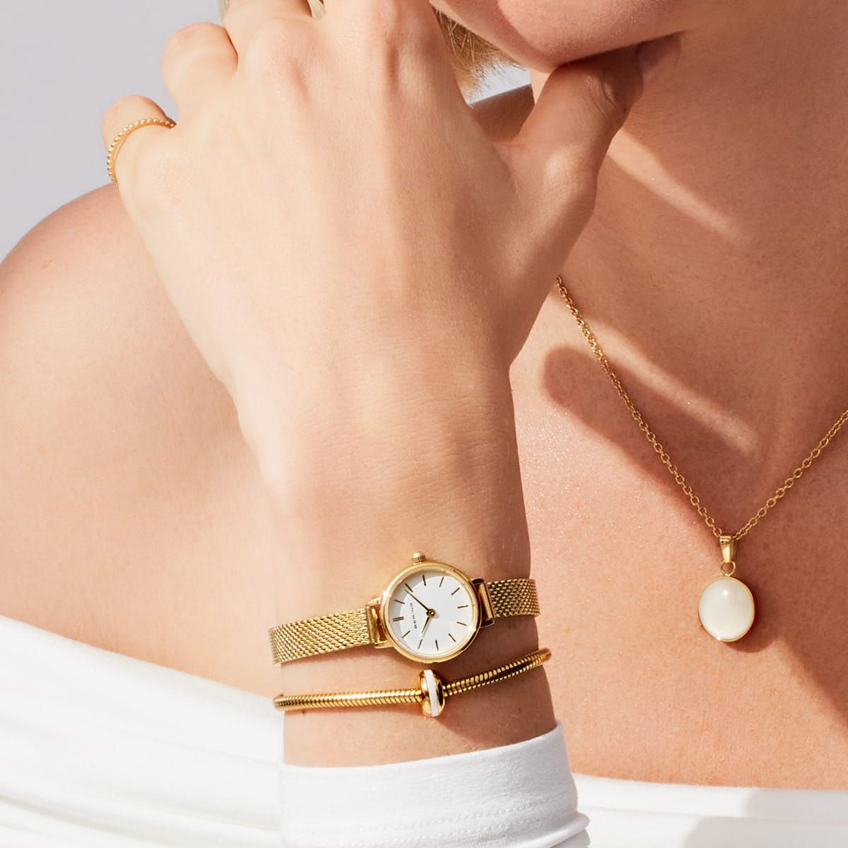 Bering 11022-334  Damenuhr gold Klappschließe Edelstahl vergoldet  Milanaise-Armband