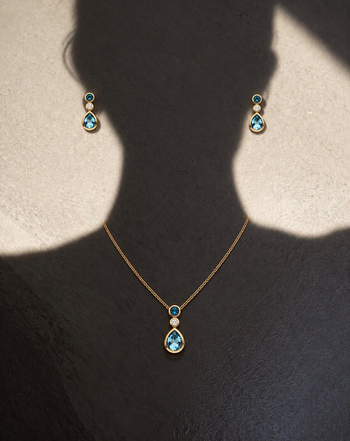 Anhänger mit Kette mit 1 Brillant zus. 0,11ct. & 1 London Blautopas (beh.) & 1