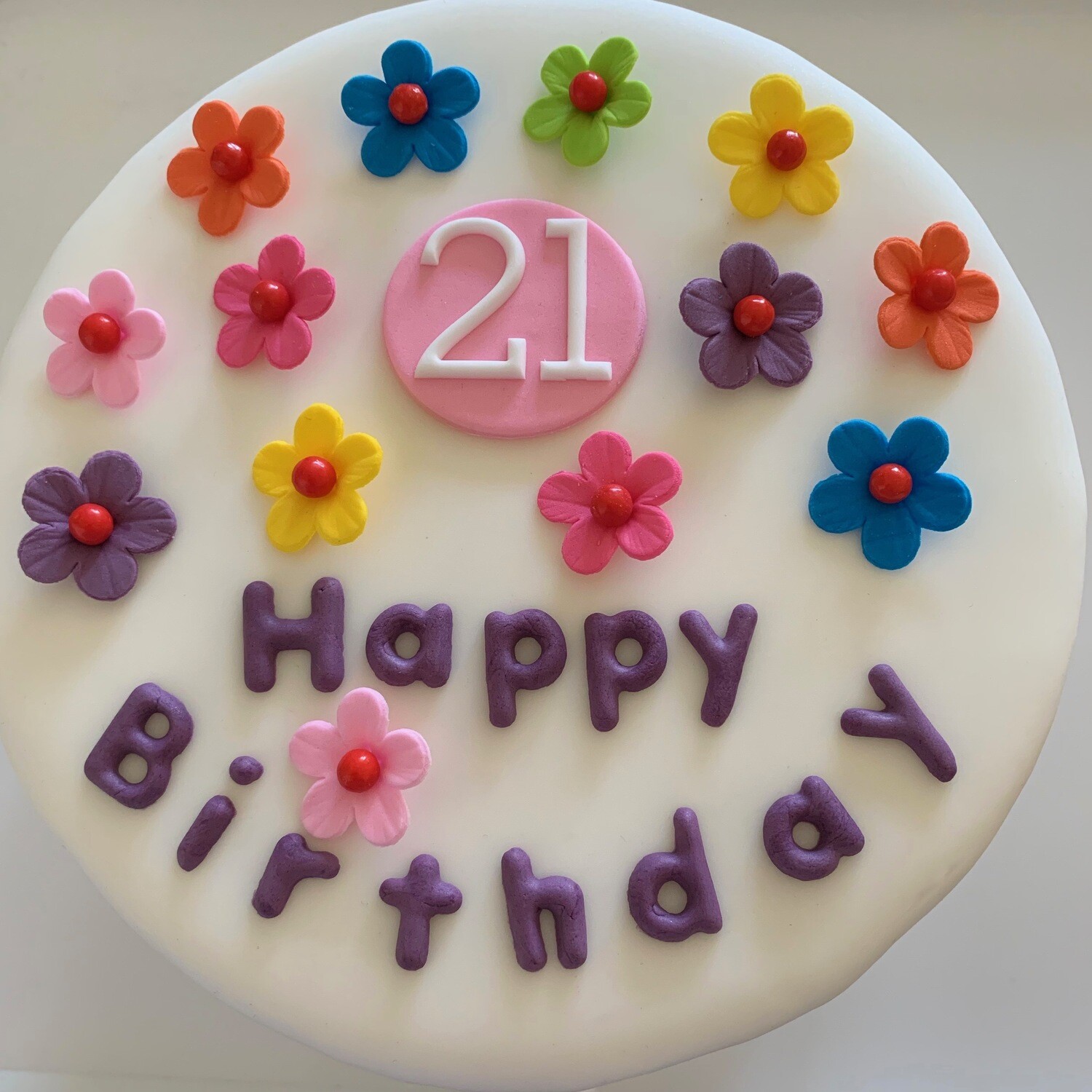 Number Plaque. One small round sugar paste plaque with white number in a colour of your choice for adding to any of our products. Suitable for birthday, anniversary and special milestone cakes.