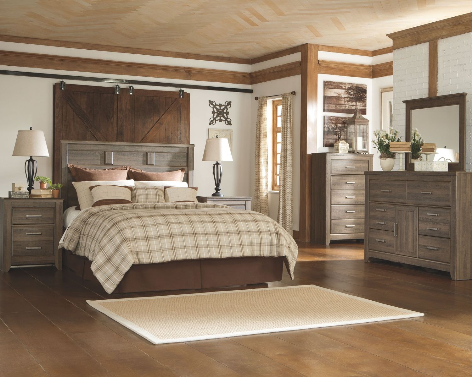 Juararo - Dark Brown - 4 Pc. - Dresser, Mirror, Chest, Queen Panel Headboard