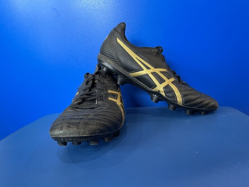Black and gold asics boots sales