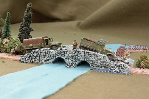 Battle-damaged European stone bridge