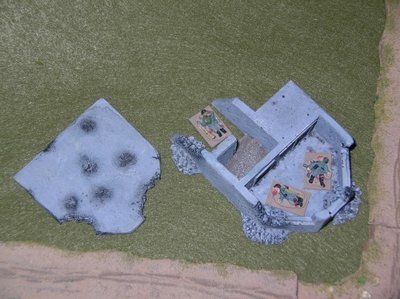 Battle-damaged concrete infantry bunker