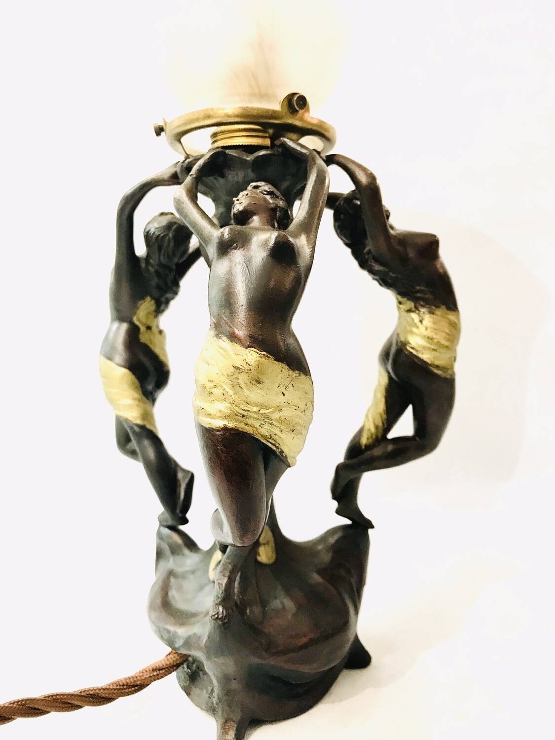 Art Nouveau lamp with 3 almost naked women graces dancing in a circle holding the shade overhead around 1900 bronzed white metal , bronzed spelter pewter,  original white glass shade Origin: Paris France, erotic, posture like Hercules