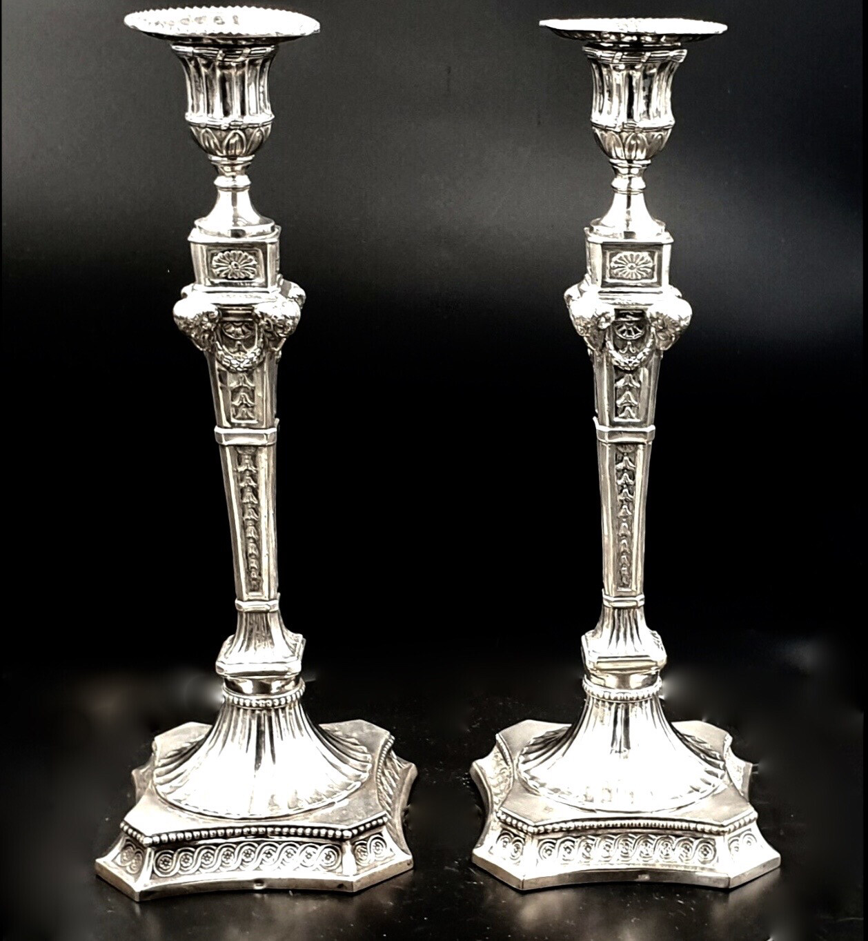 pair of silver candlesticks in the englisch taste France , Belgien end of 18th century beginning of 19th century with rams heads design