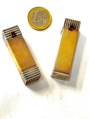 Pair of Ladies elegant square silver gold ladies lipstick holder and matching petrol lighter with square ruby as push button for opening made in France around 1940/50 high quality