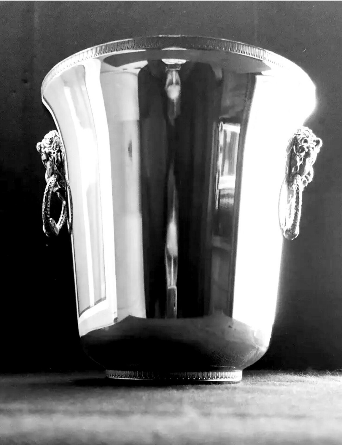 Champagne cooler silverplated with  bacchus and rings as handles 