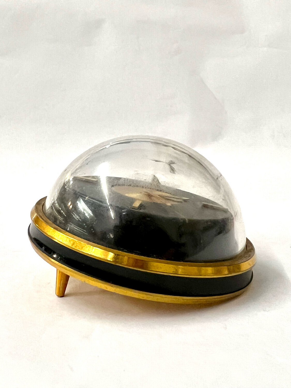 Jaeger Le Coultre 8 day Memovox alarm with black dial , brass table clock circa 1960s Midcentury, domed perspex glass tilted to one side on feet space age spaceship