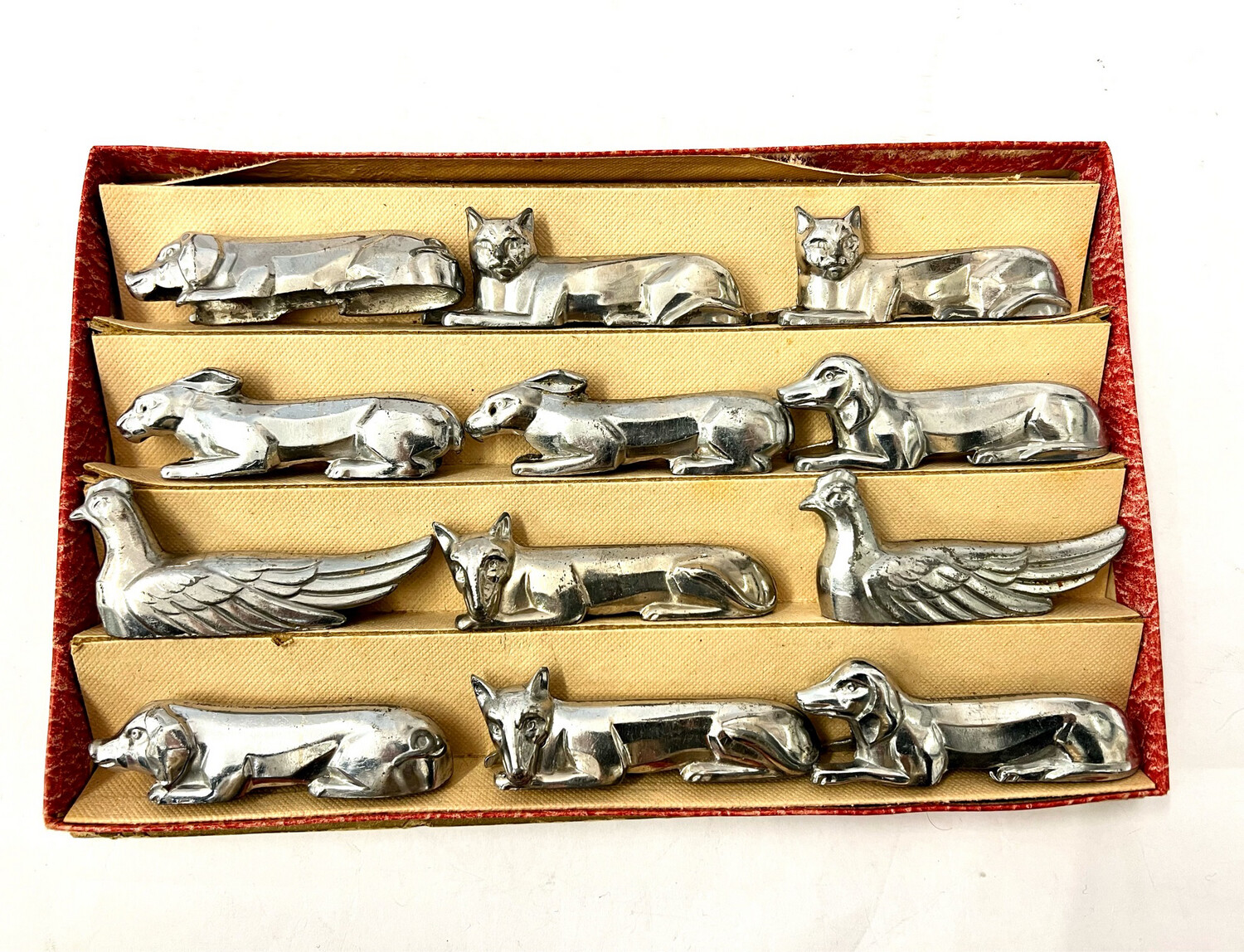 12 chrome knife rests Art Deco chrome rubbed around 1925, each one twice fox, rabbit, pig, dog, cat, chicken
