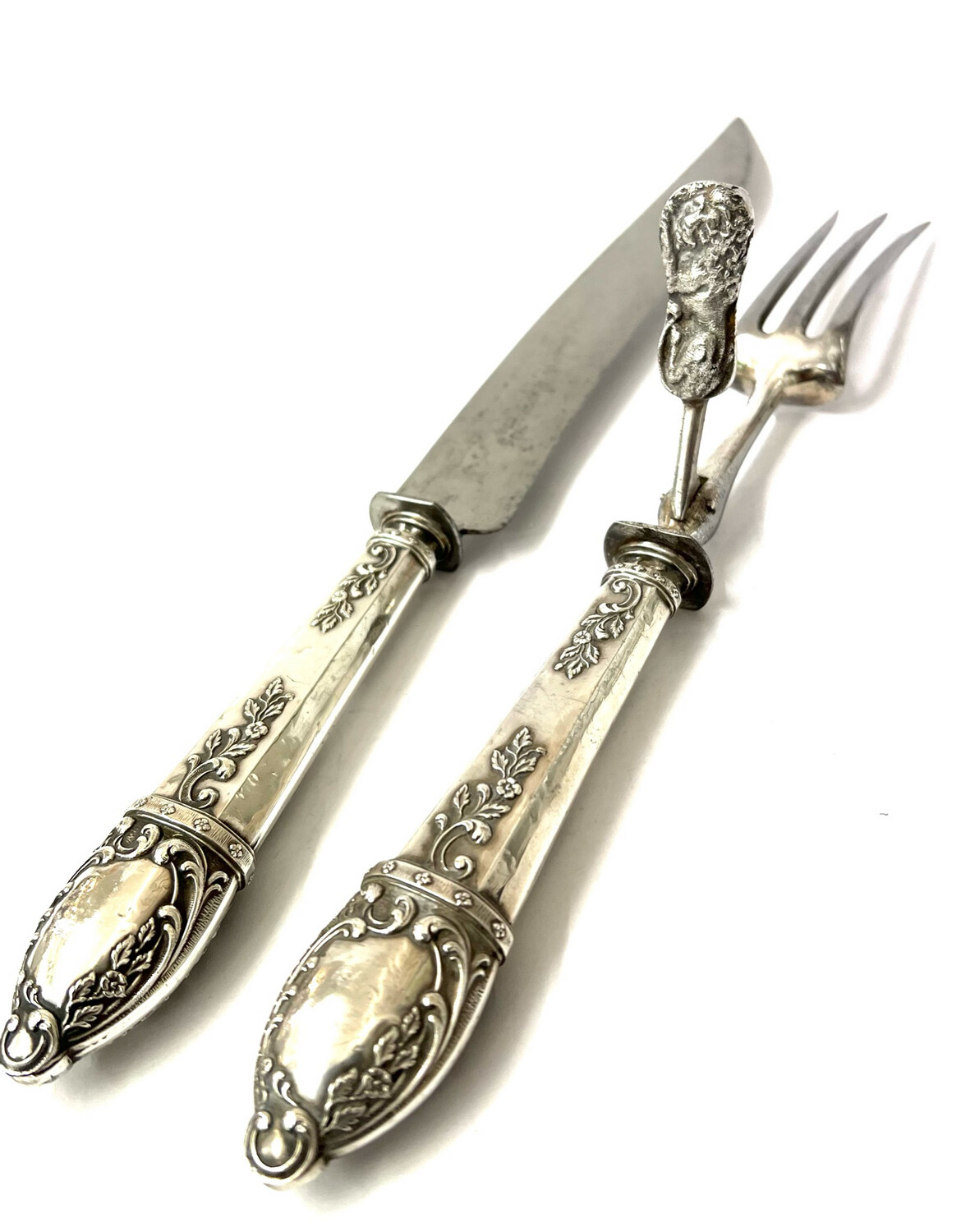 Carving set cutlery with lions as a protector whilst carving , silver handles, steel blade and fork around 1880, France, 19th century