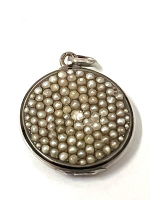 Medallion locket to open for photos silver black enamel set with pavé pearls and a diamond rose in the center made around 1910 France 