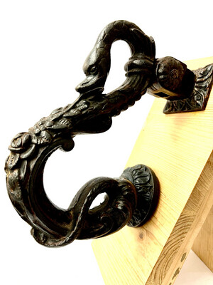 Antique door knocker with iron counterpart Napoleon III historicism around 1870 design with swan head made of cast iron in the Renaissance style