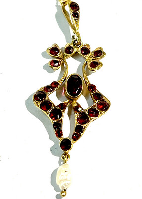 Beautiful Pendant with chain both made from 925 silver and gold plated in the Art Nouveau taste set with red garnets decorated with a pearl suspension