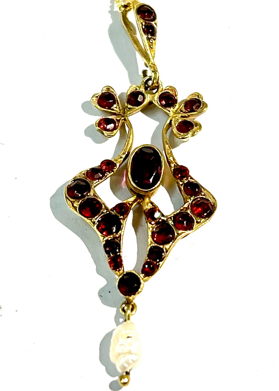 Beautiful Pendant with chain both made from 925 silver and gold plated in the Art Nouveau taste set with red garnets decorated with a pearl suspension