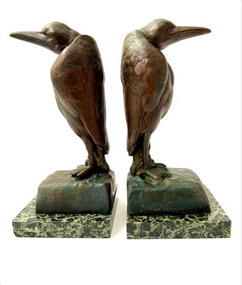 Paar Buchstützen Bücherstützen, signiert „Van de Voorde“ bronziertes Metal Art Deco um 1925 , Marabou