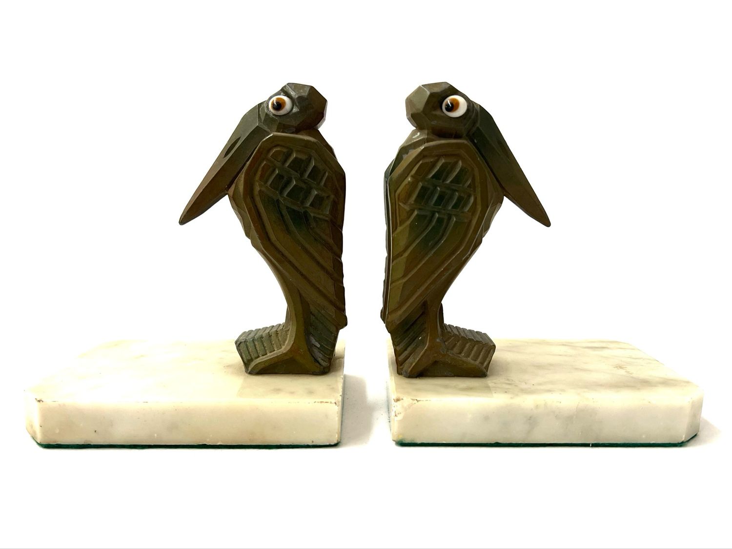 Paar amüsante Art Deco Buchstützen Bücherstützen als Marabus aus bronziertem Metall mit Glasaugen signiert H. Moreau Frankreich  
