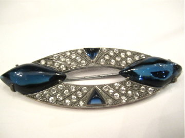 unusual large silver paste brooch with blue cabochons and white paste rhodium plated